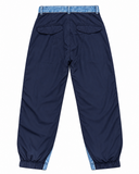 CALÇA JEANS COM TECIDO ANIMALE